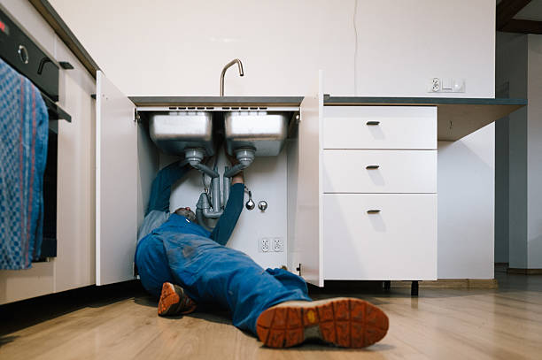 Professional Plumbing technician working in Langley, KY